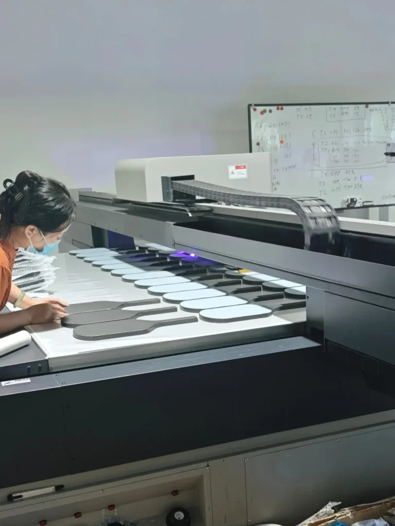 ApexonSport pickleball paddle manufacturer UV printing process for professional OEM production.