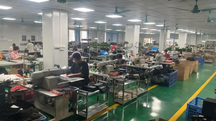 Precision sewing line for custom branded neoprene pickleball paddle covers - ApexonSport manufacturing.