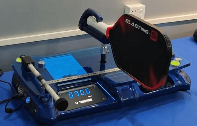 Pickleball paddle swing weight testing equipment at Apexon Sport quality control lab