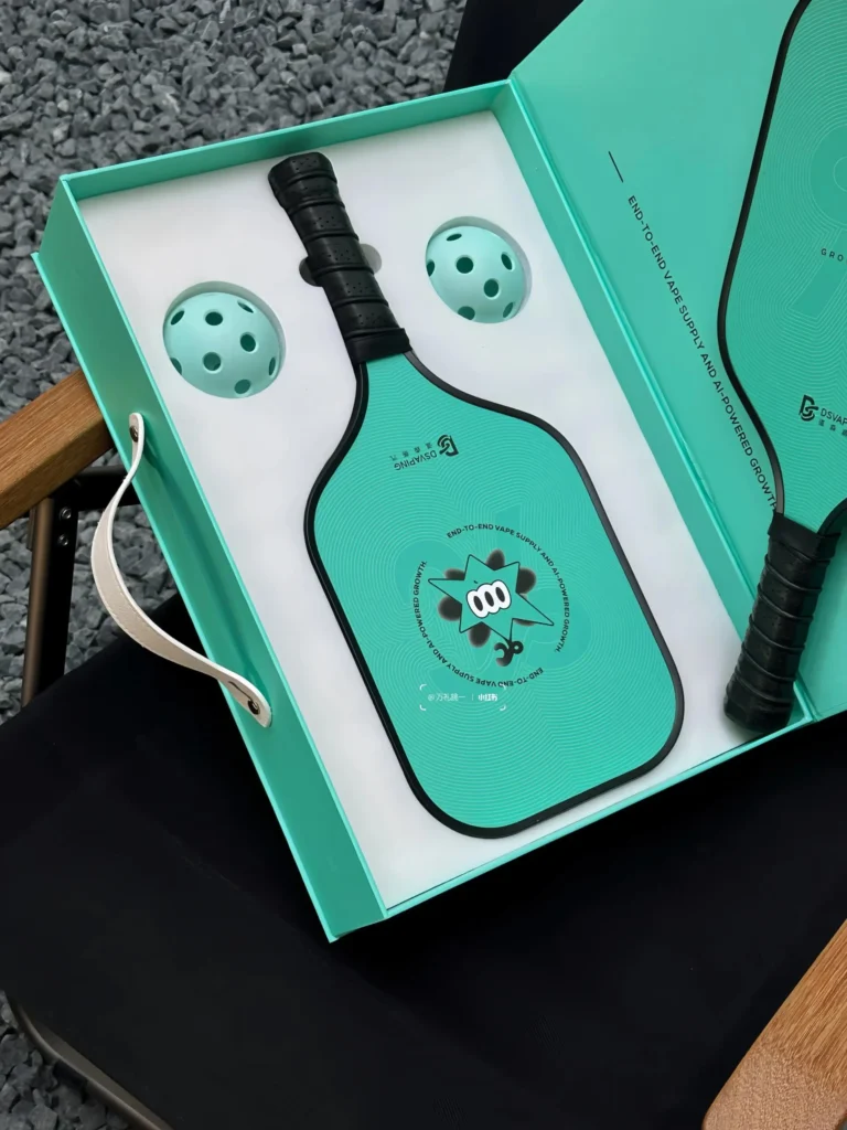 Custom OEM racket packaging: Tennis racket gift box bundled with a blank carbon fiber pickleball paddle ready for branding.